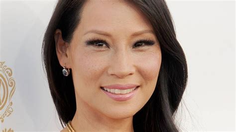 lucy liu hot|Lucy Liu looks gorgeous in purple string bikini in rare。